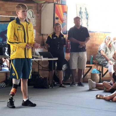 Tim Hodge talks to up and coming MC swimmers at Swimming North Coast Development Day