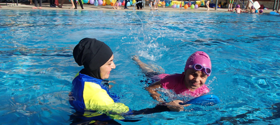 Learn to Swim CALD muslim woman swimming instructor
