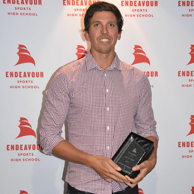 Craig Stevens holding Endeavour Hall of Fame Award