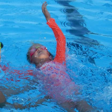 Swimming lessons learn to swim first lap