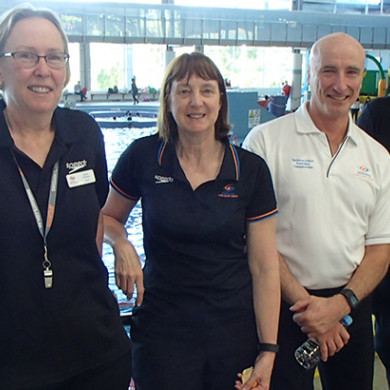 Swimming NSW officials working together at a development meet