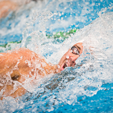 Competitive swimmer mid stroke