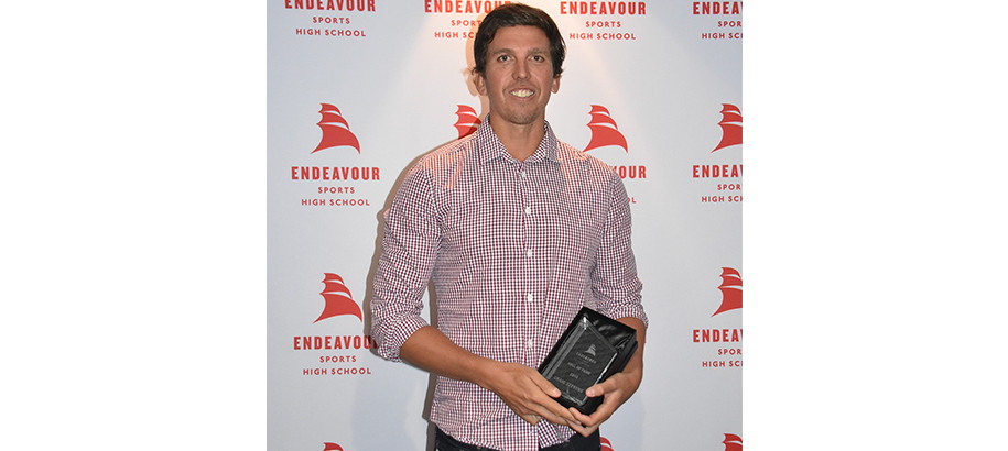 Craig Stevens holding Endeavour Hall of Fame Award