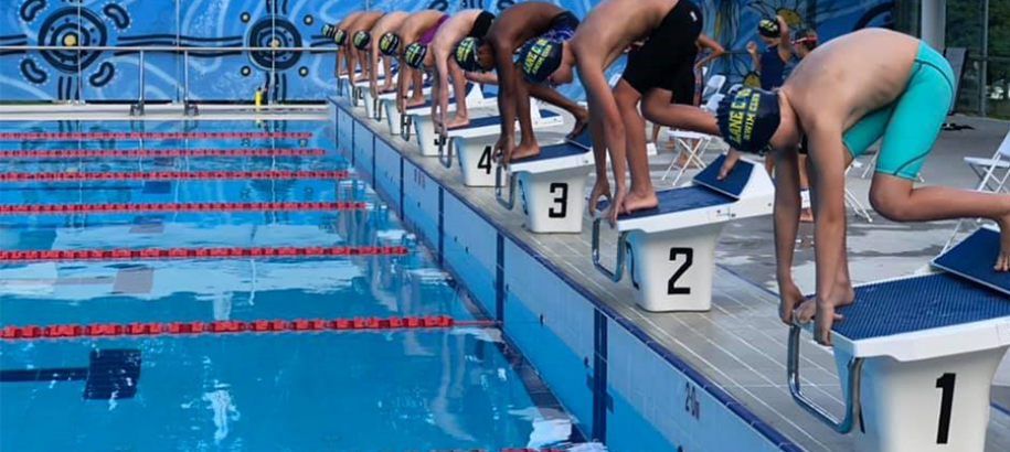 Lane Cove swimmers on the blocks