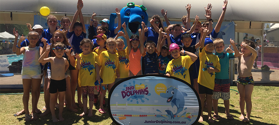 Optus Junior Dolphins at a carnival with Yampu