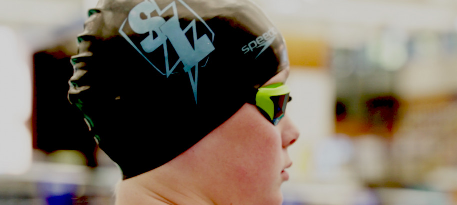 Swimmer in Swim League cap